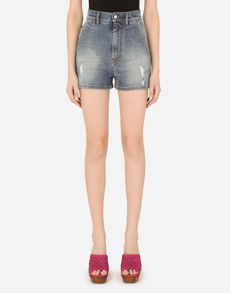 Denim shorts with ripped details - 1