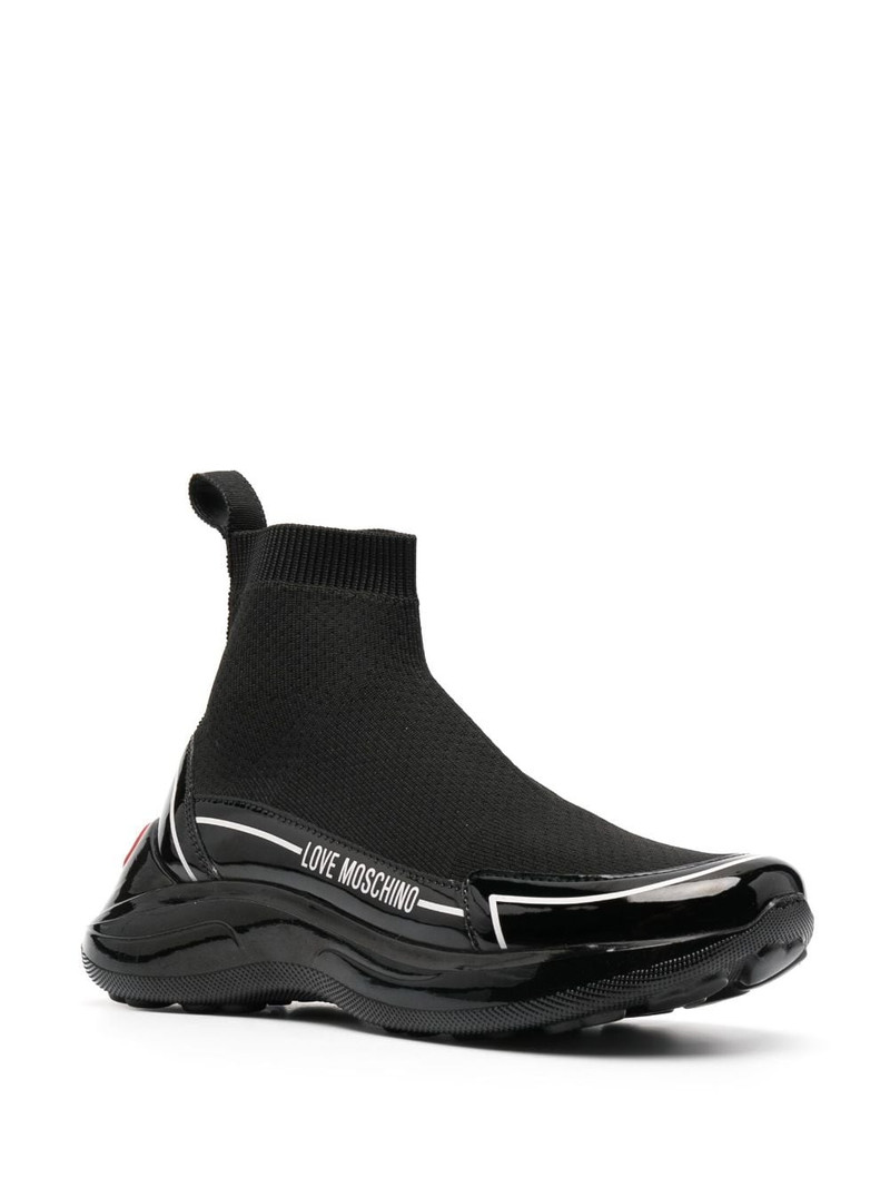 Moschino logo-embossed high-top sneakers outlook