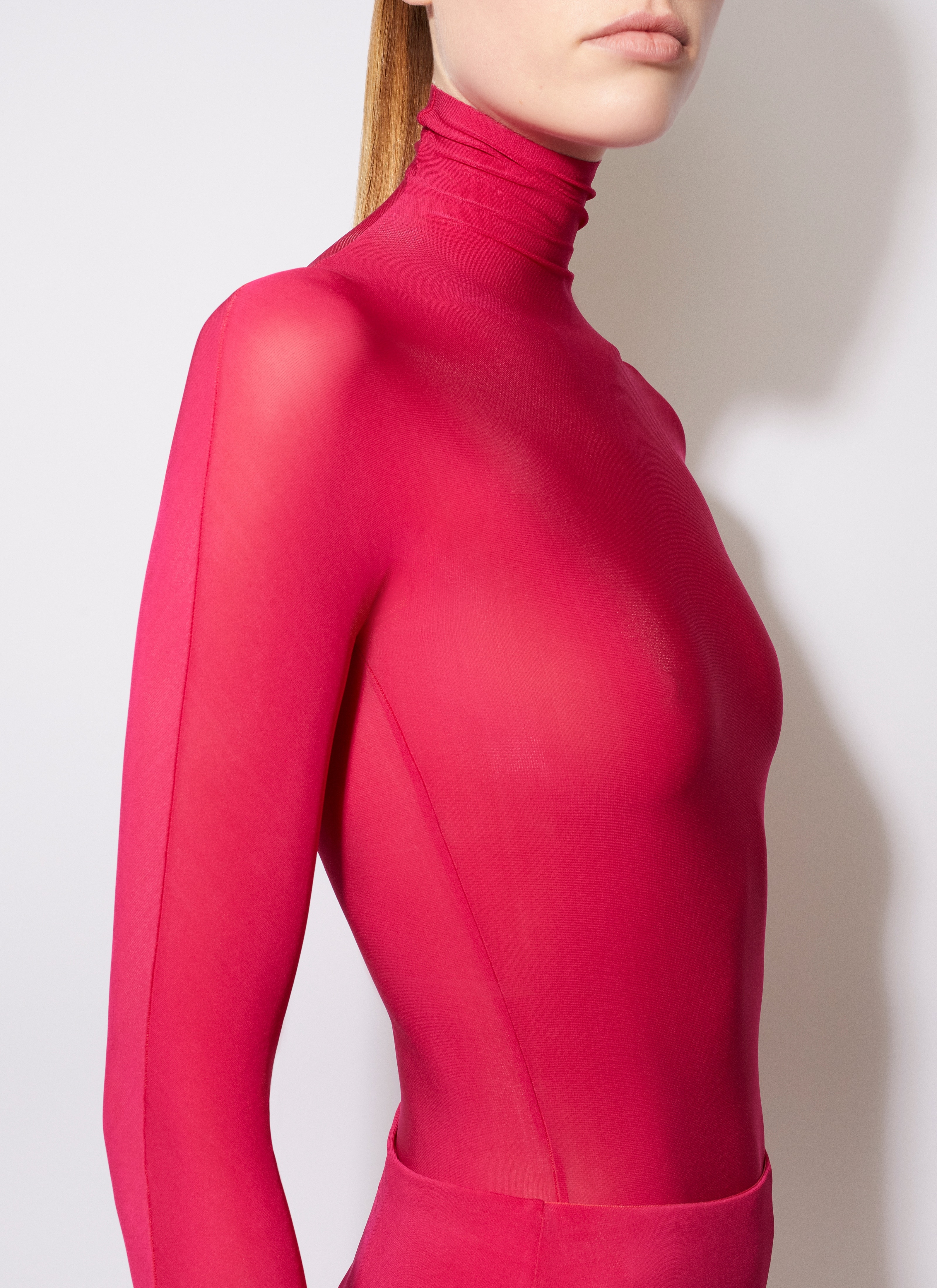 Lace turtleneck bodysuit in pink - Alaia