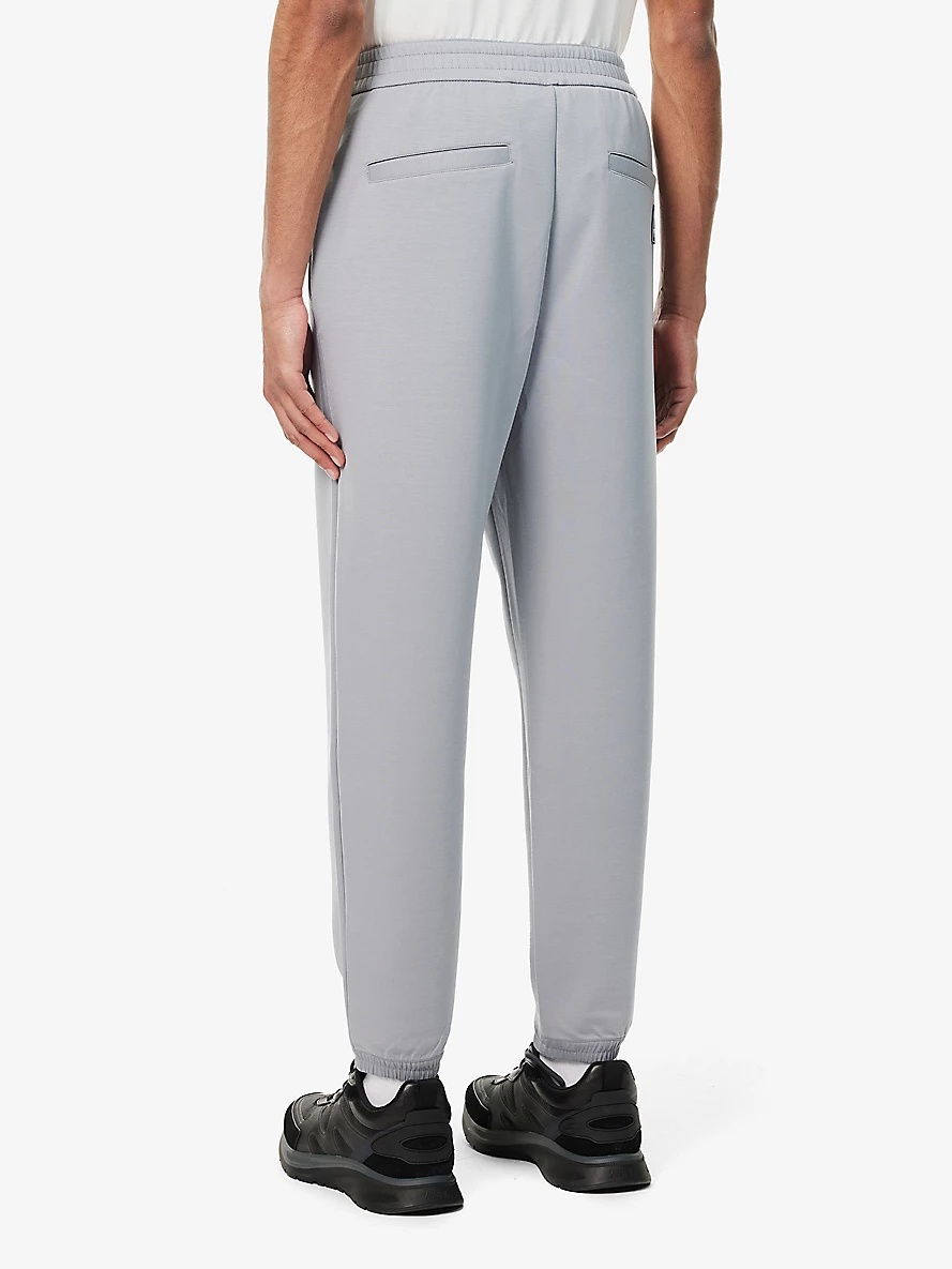 Logo-patch relaxed-fit stretch-woven blend jogging bottoms - 4