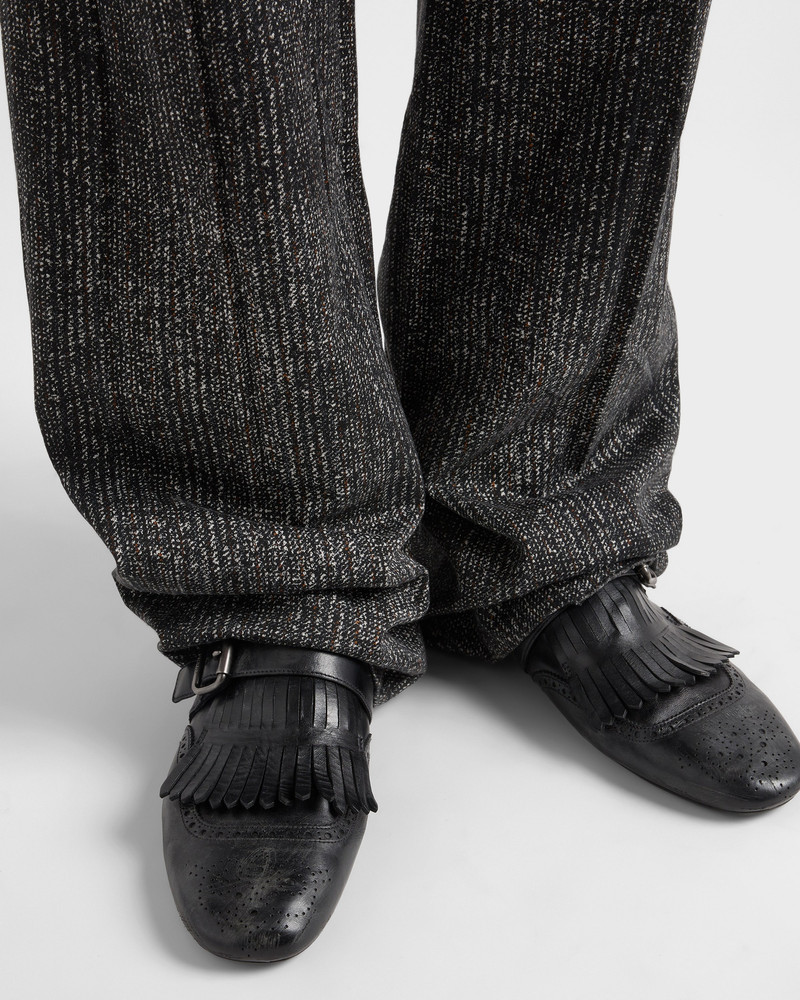Prada Shuffle antiqued leather mules with buckled strap and fringe outlook
