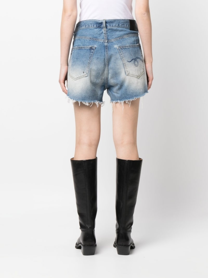 Crossover asymmetric distressed denim shorts