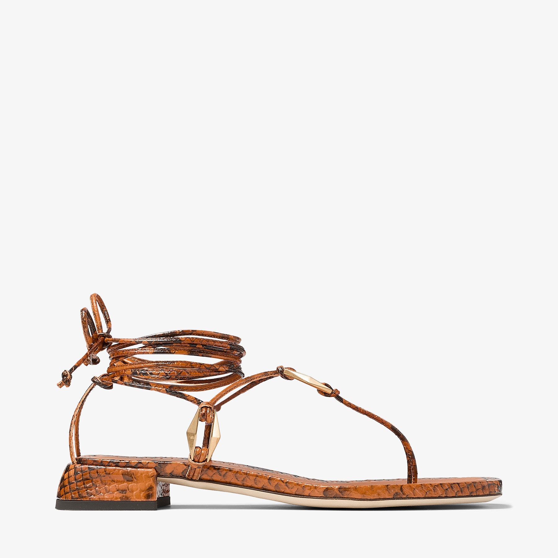 Onyxia Flat
Copper Snake Print Sandals - 1