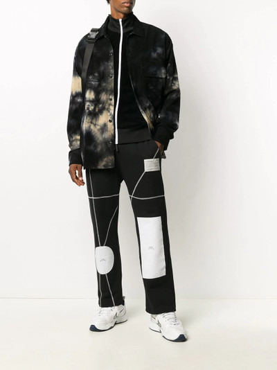 A-COLD-WALL* patchwork-print drawstring trousers outlook