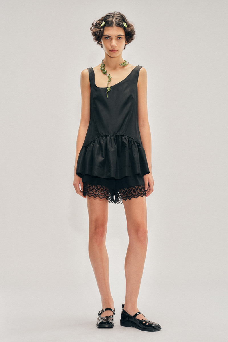 Tilted Neck Peplum Top 1