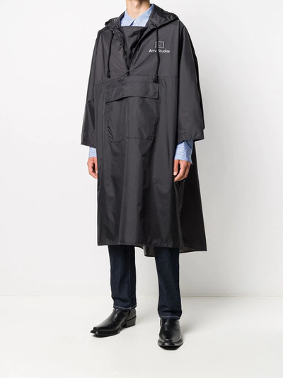 Acne Studios logo-print poncho-style raincoat outlook