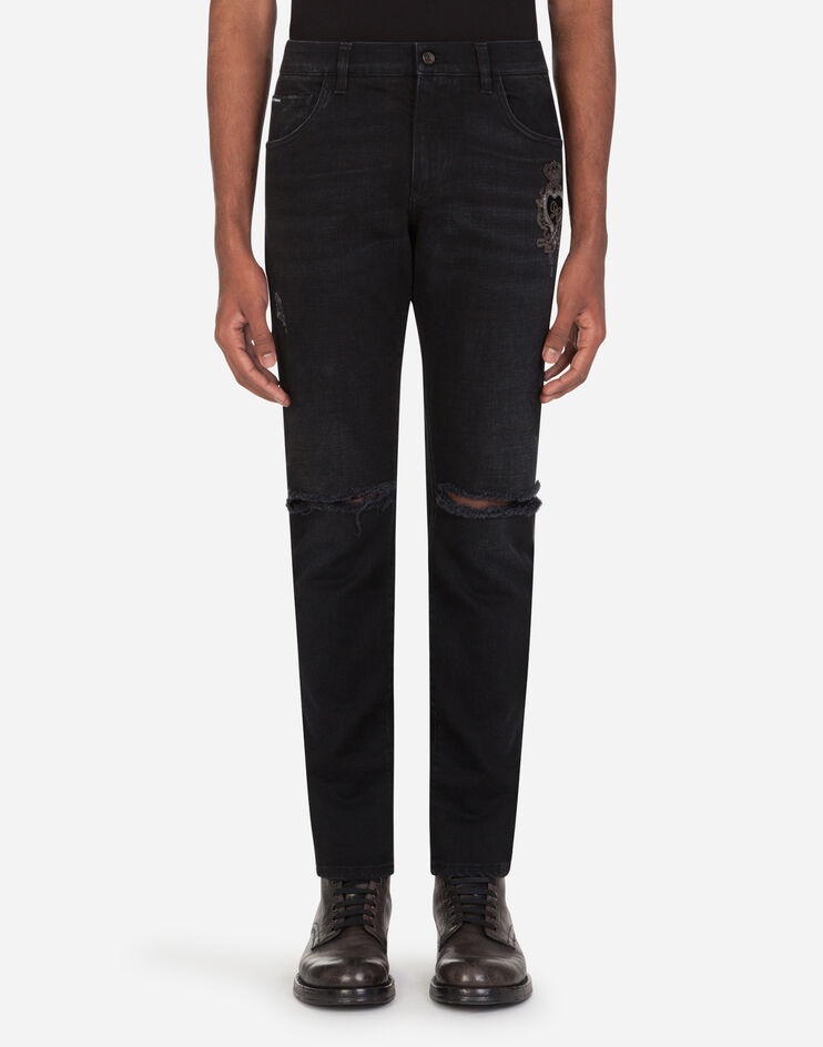 Washed black slim-fit stretch jeans with patch detailing - 1