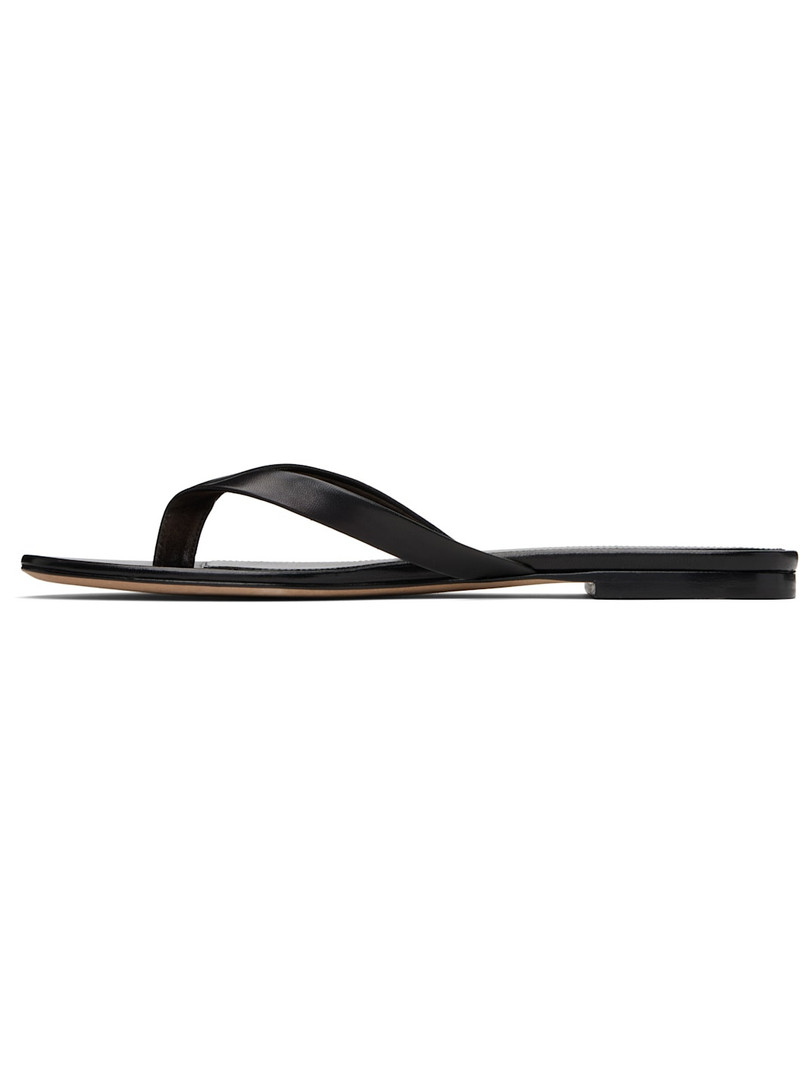 The Row Black Sacha Flip-Flops outlook