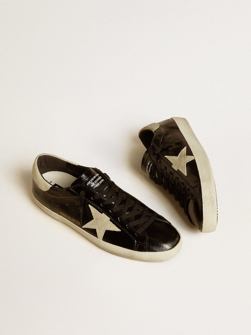 Golden Goose Men's Super-Star LTD in black patent leather with suede star and heel tab outlook