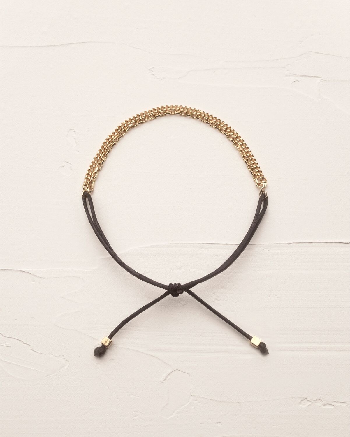 DUAL CHAIN BRACELET IN 18K YELLOW GOLD AND LEATHER - 1
