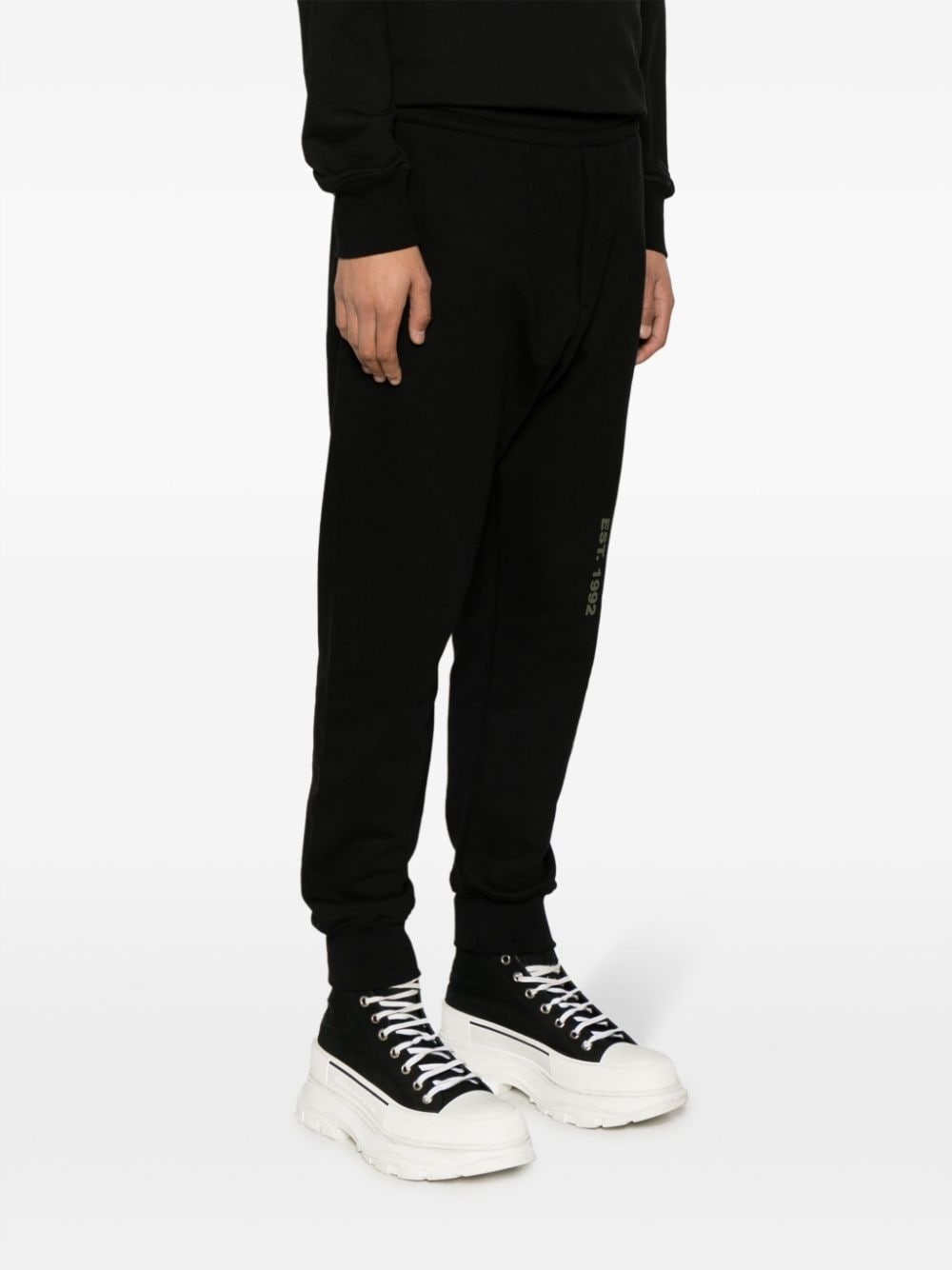 Graffiti-print cotton track pants - 3