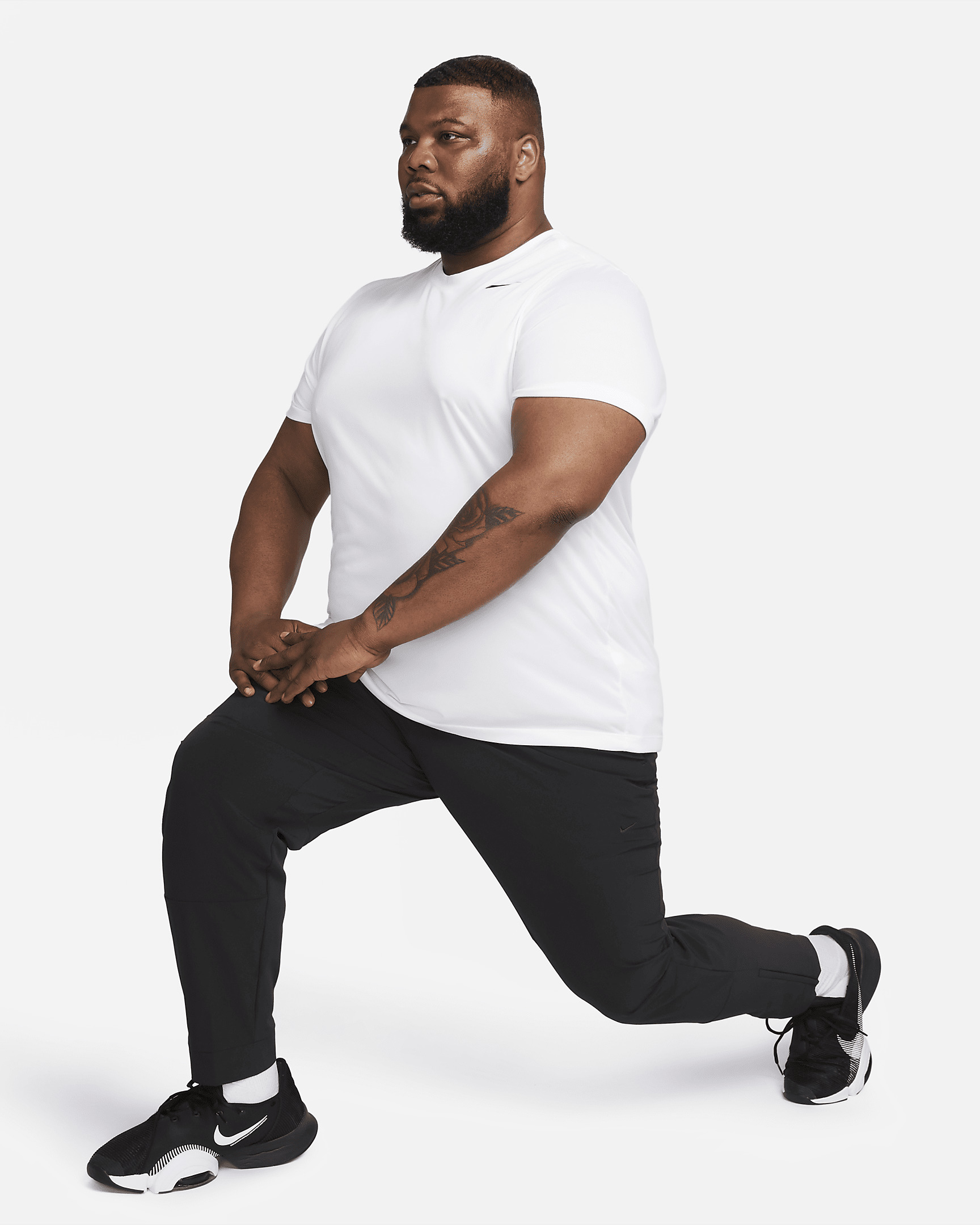 Nike Unlimited Men's Dri-FIT Zippered Cuff Versatile Pants - 13