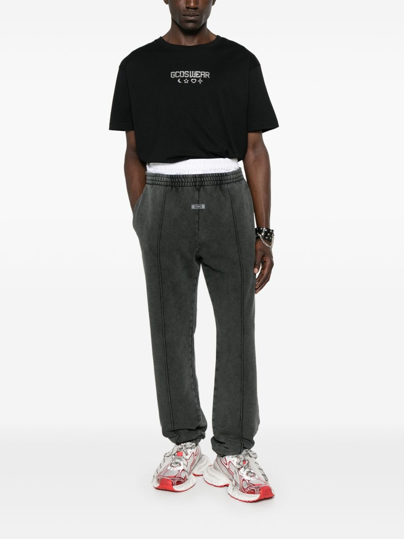 GCDS stone-washed track pants outlook