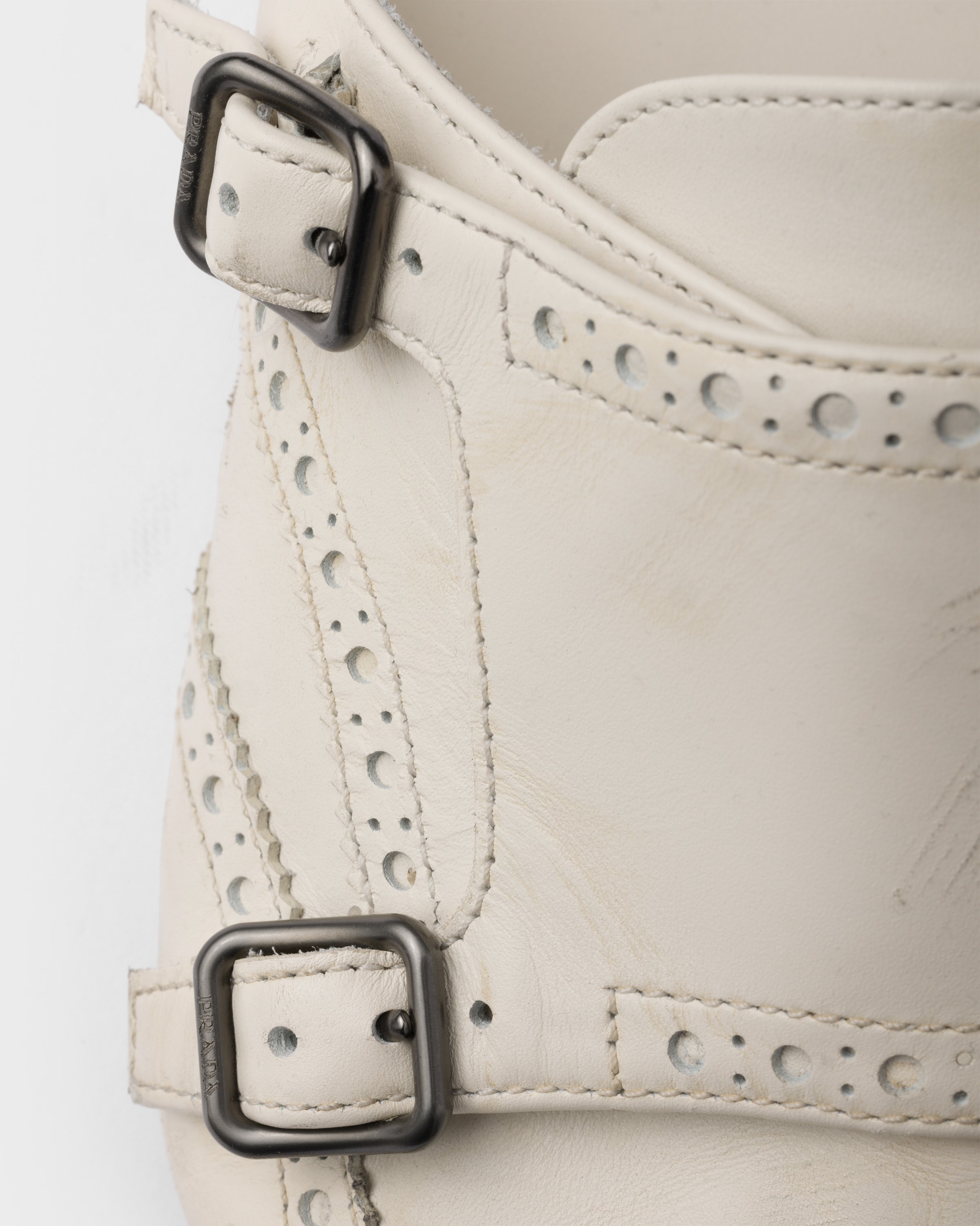 Prada Shuffle antiqued leather double monk strap mules