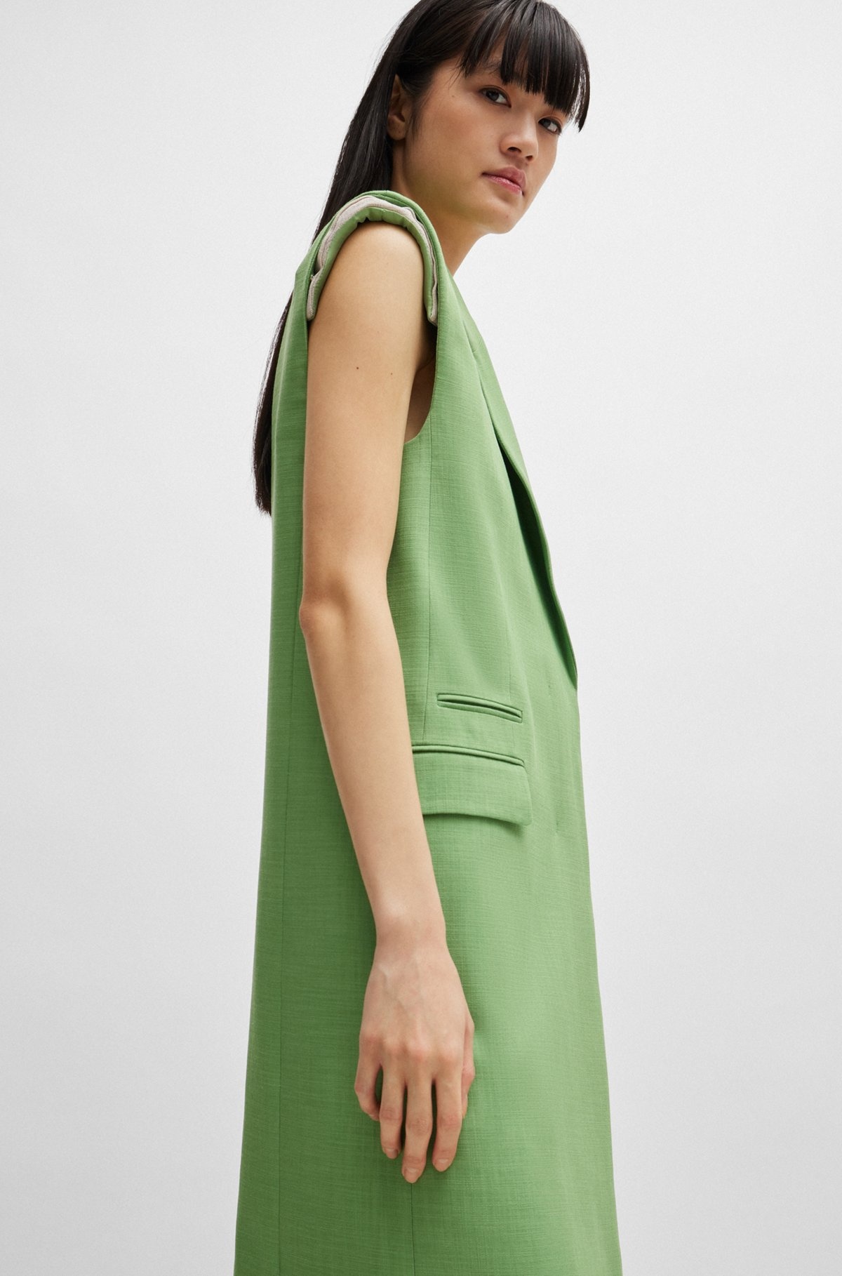 SLEEVELESS JACKET WITH CONCEALED CLOSURE AND SIGNATURE LINING - 6