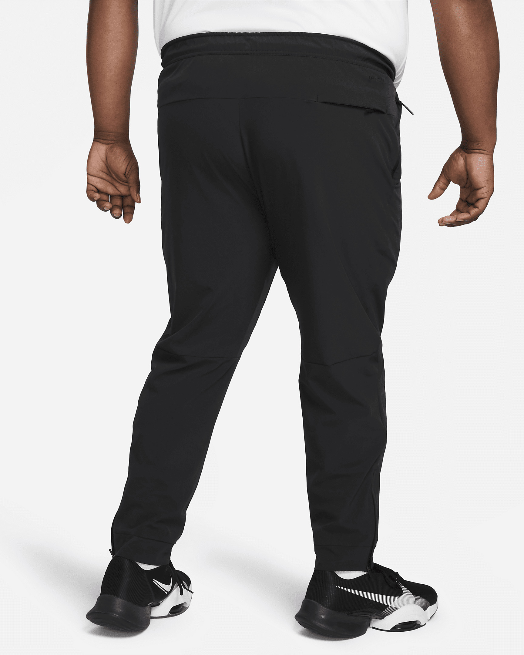 Nike Unlimited Men's Dri-FIT Zippered Cuff Versatile Pants - 9