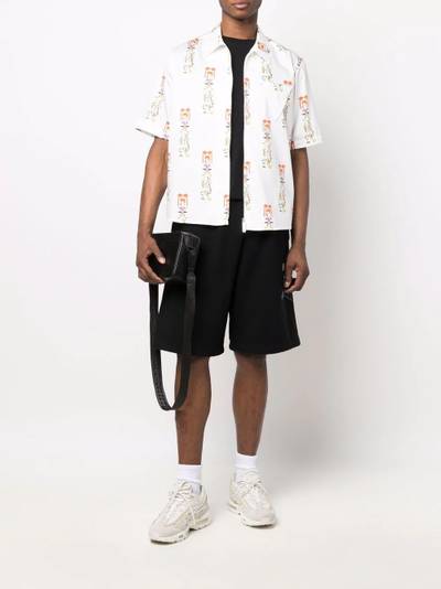 UNDERCOVER graphic-print cotton shorts outlook
