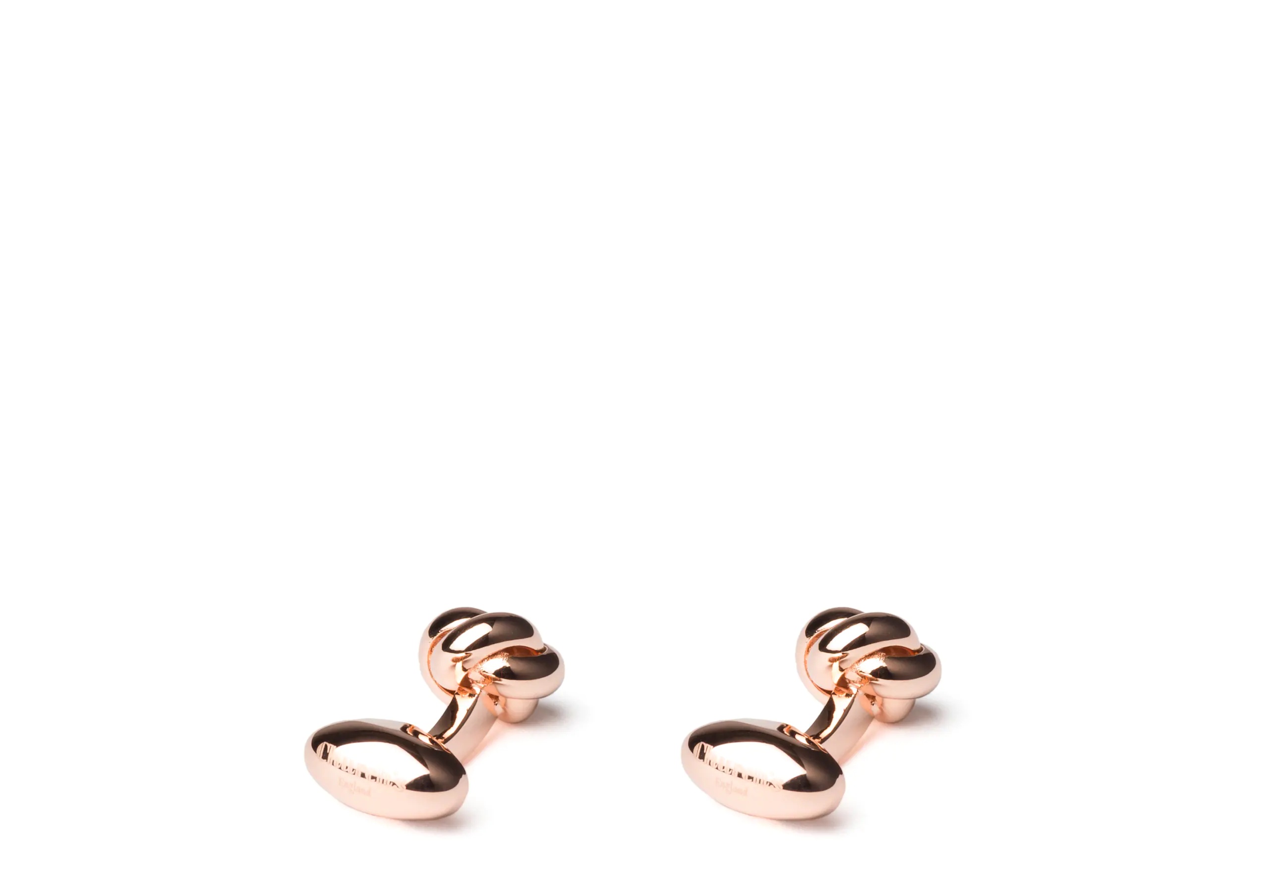 Knotted cufflink
Rhodium Plated Knot Rose gold - 2