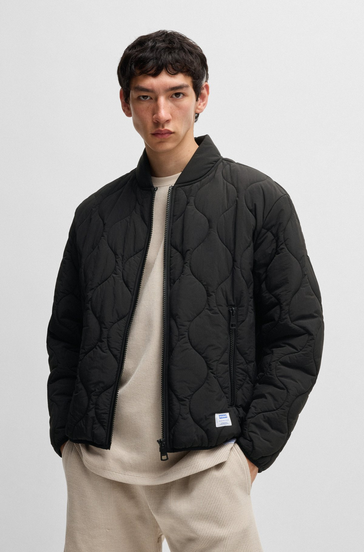 WATER-REPELLENT QUILTED JACKET WITH LOGO BADGE - 2