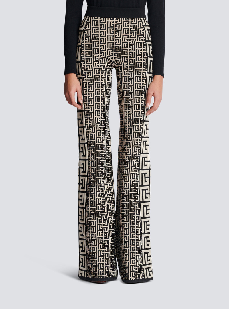 Monogrammed fine knit flared trousers 5