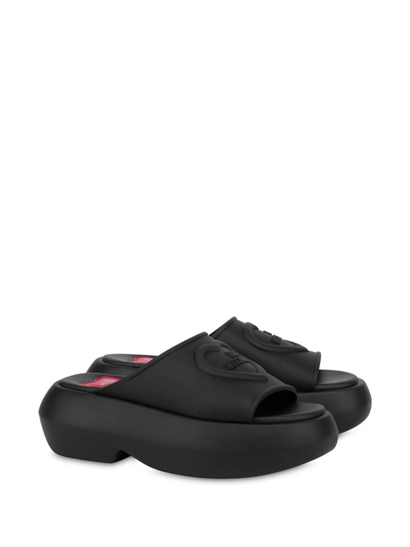 Moschino logo-embossed slides outlook