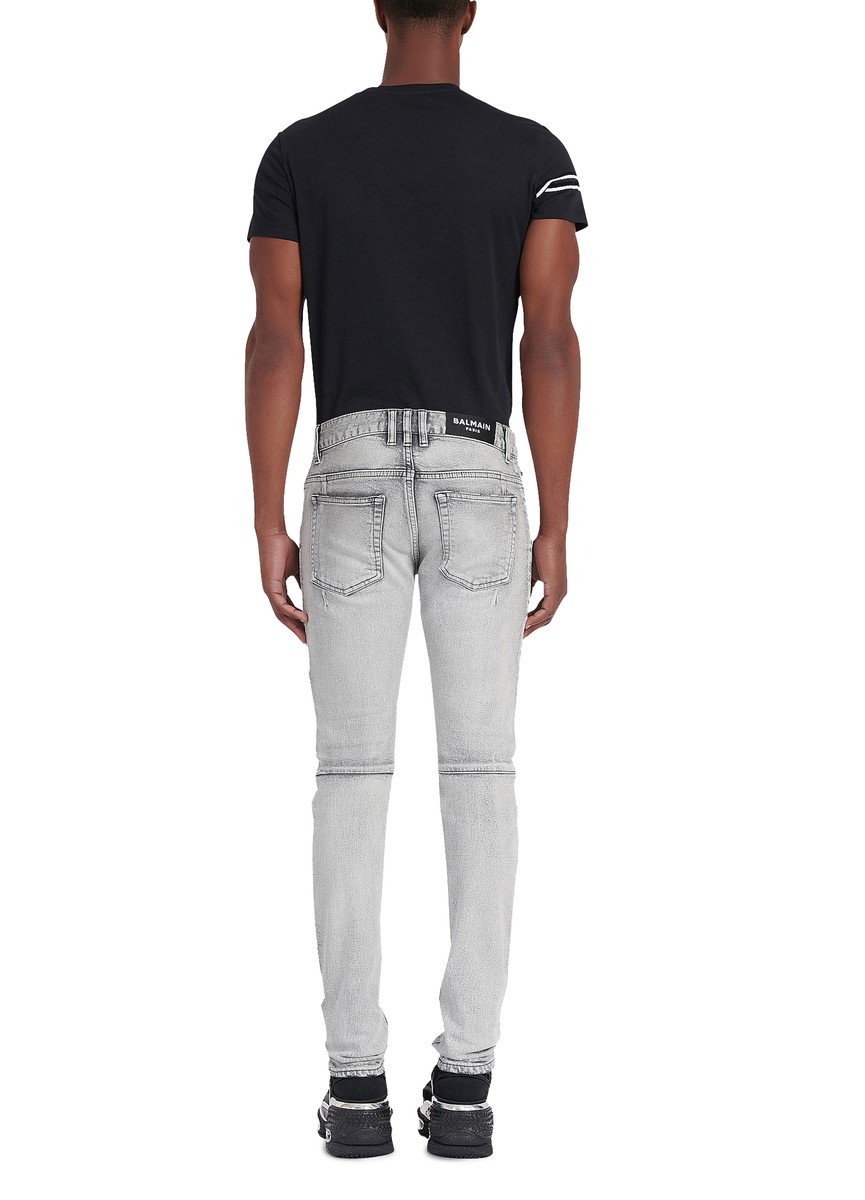 Slim cut ripped cotton jeans with synthetic leather panels - 3