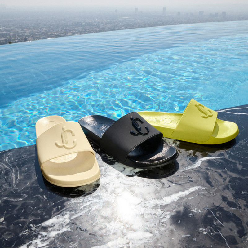 Port/M
Black Rubber Slides with JC Monogram 5