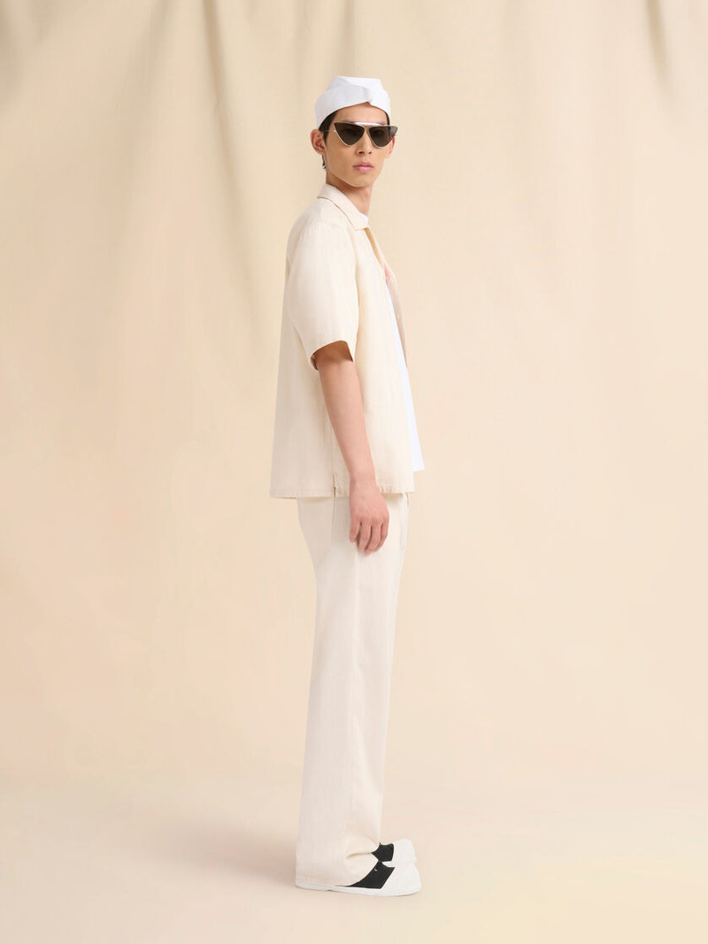 CREAM DENIM WIDE-LEG JEANS WITH TRUNKAROO PLAQUE 5