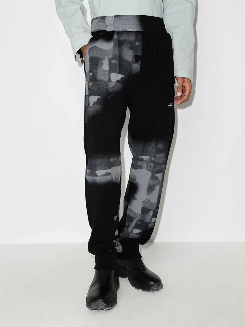 A-COLD-WALL* brushstroke-print track pants outlook