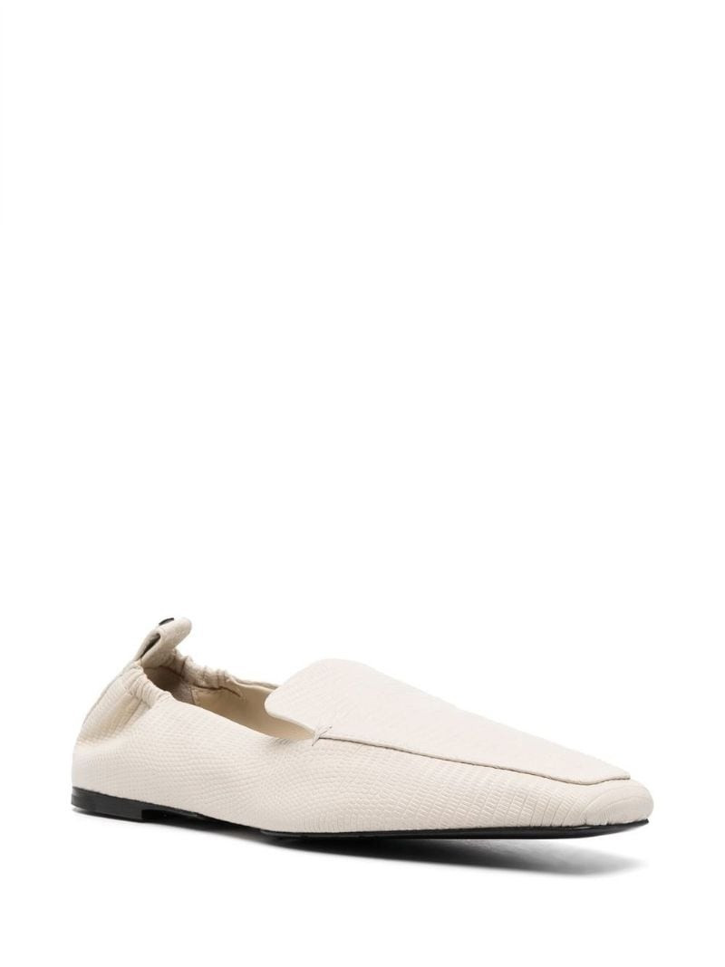 Totême The Travel lizzard-effect loafers outlook