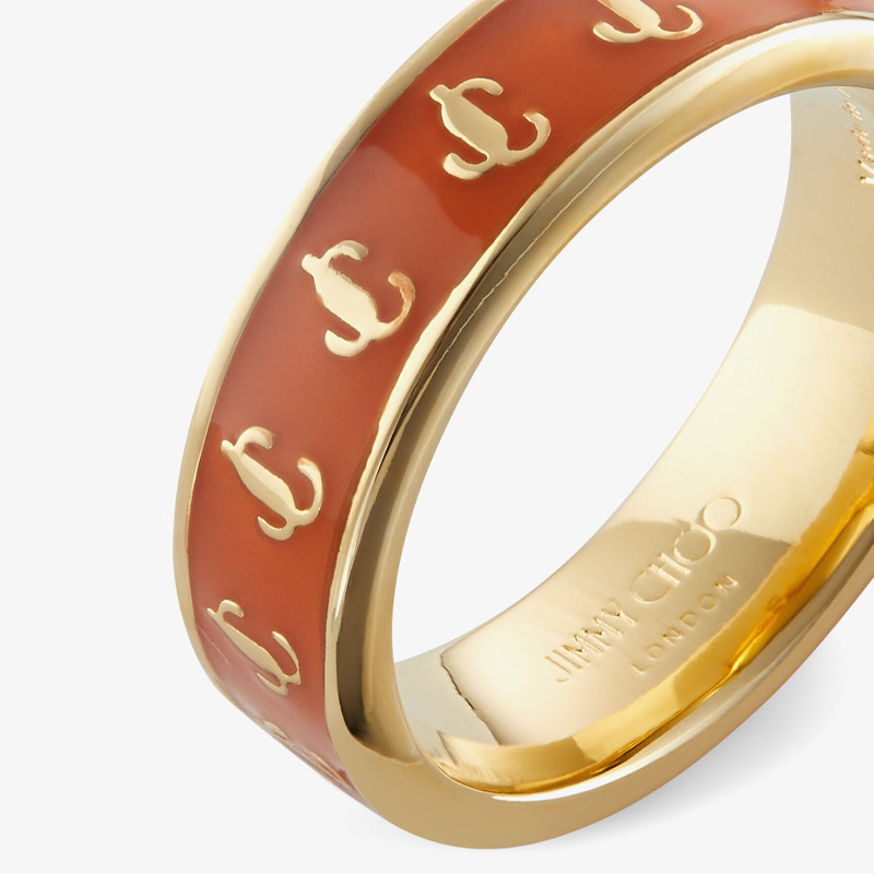 JC Enamel Ring
Gold-Finish Metal and Amber Orange Enamel JC Ring 5