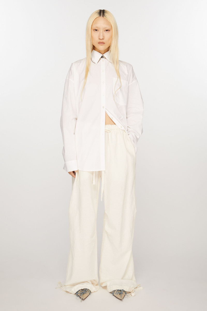 Acne Studios Relaxed drawstring trousers - Warm white outlook