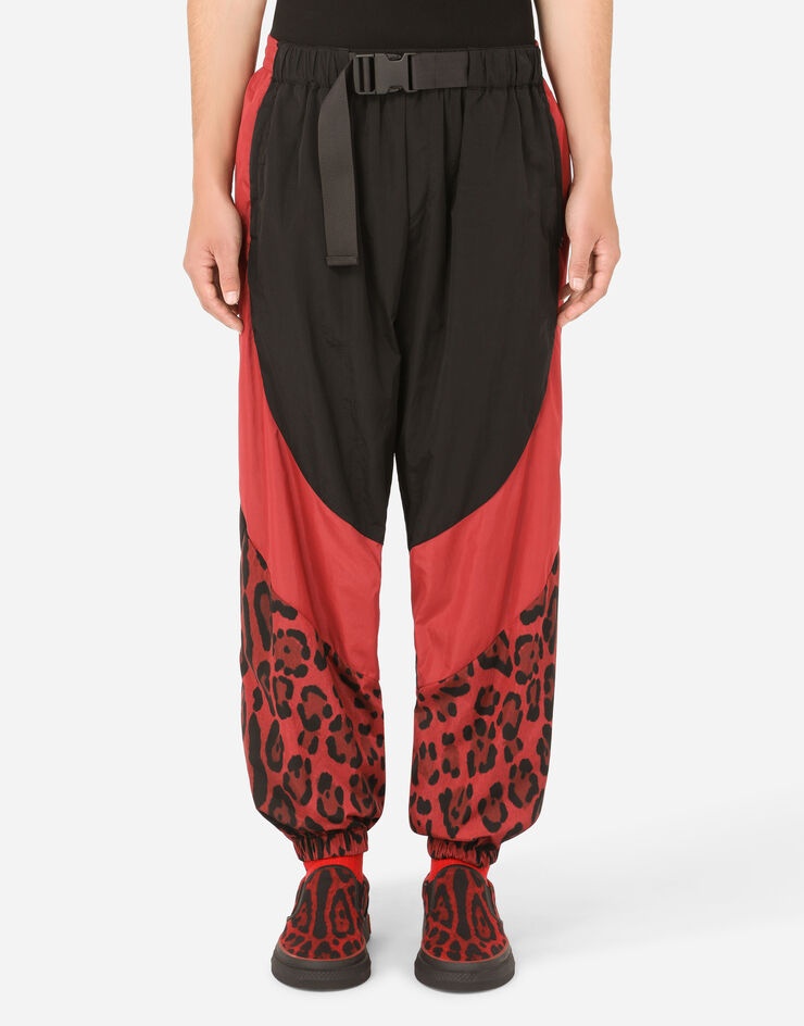 Nylon jogging pants with leopard print - 1