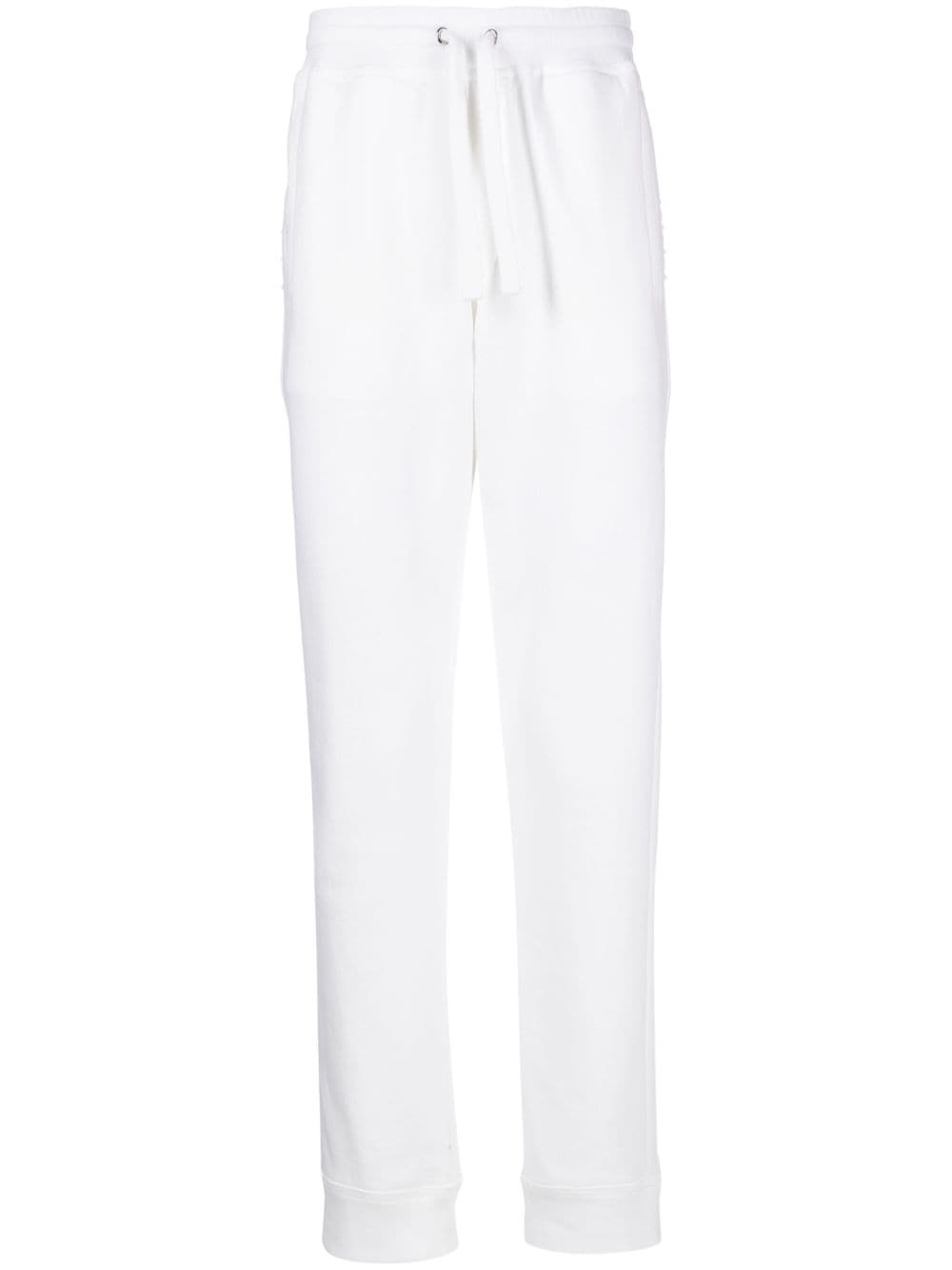 Rockstud-embellished cotton track pants - 1