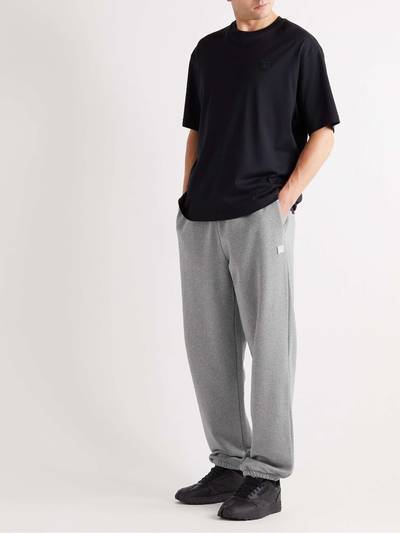 Acne Studios Tapered Logo-Appliquéd Cotton-Jersey Sweatpants outlook