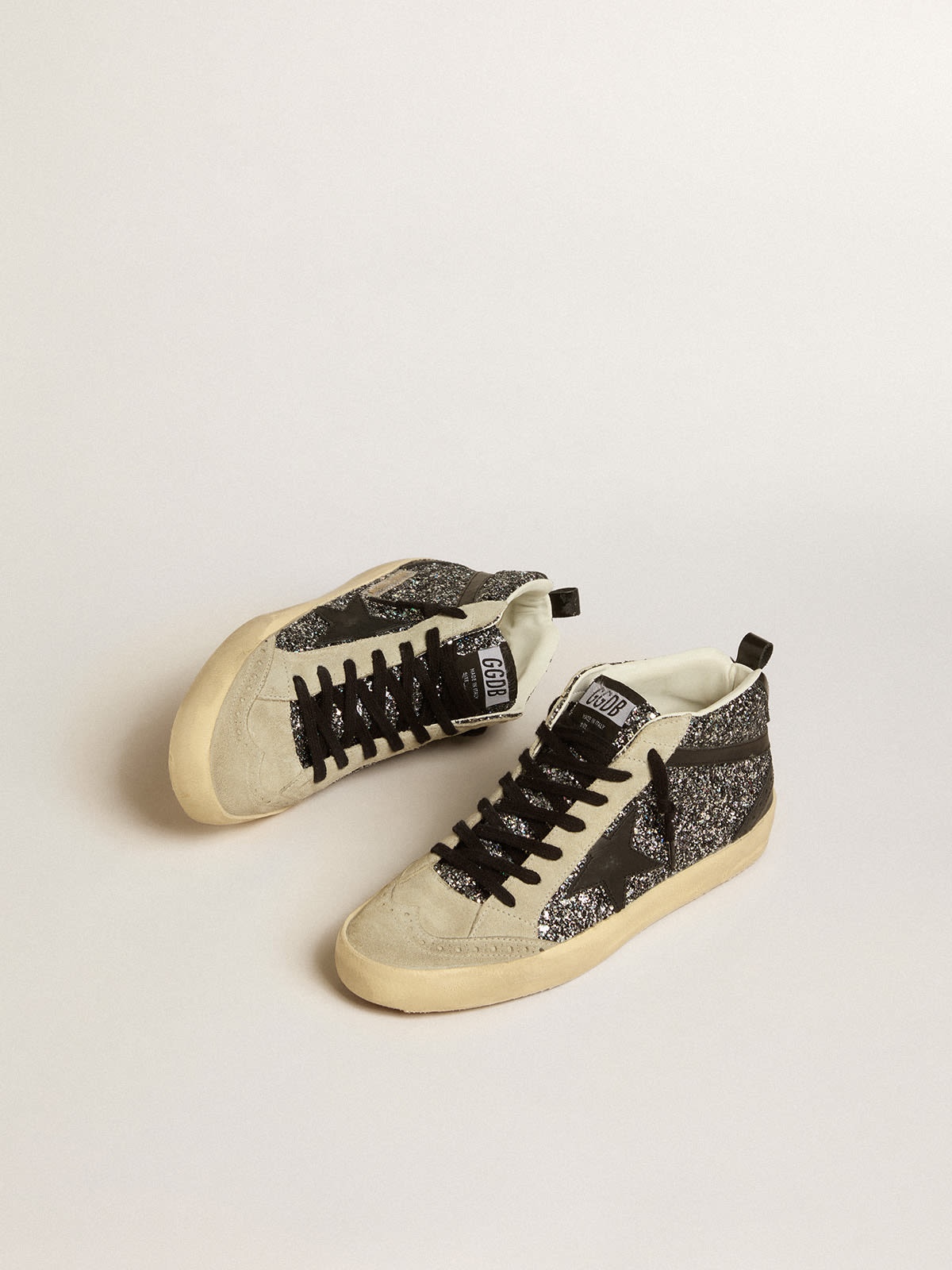 Golden Goose Mid Star LTD in black glitter with black leather star and  flash | REVERSIBLE