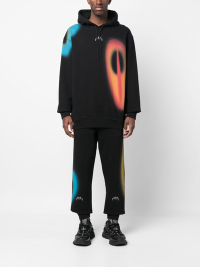 A-COLD-WALL* graphic-print track pants outlook