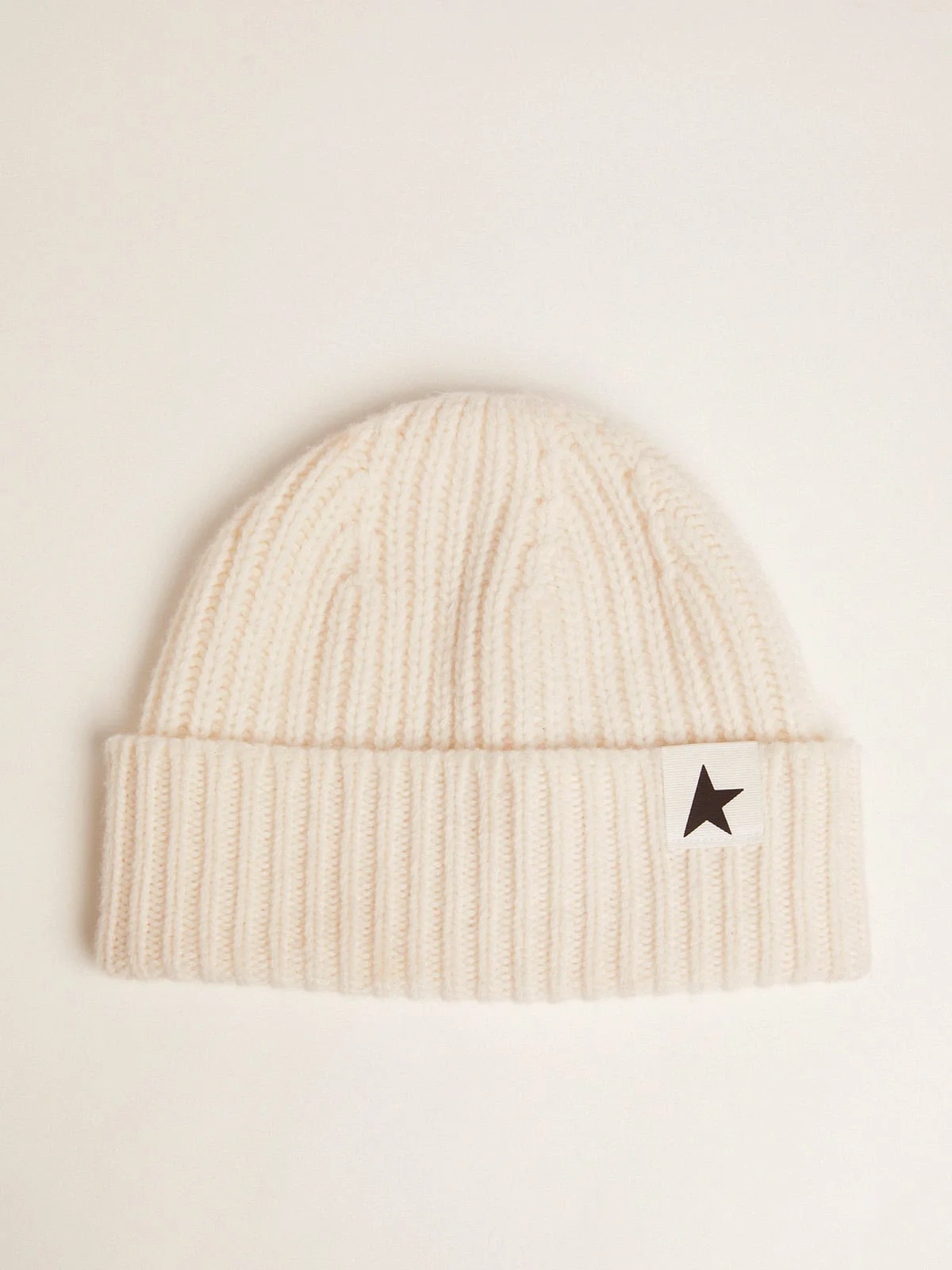 White wool beanie with contrasting black star - 1