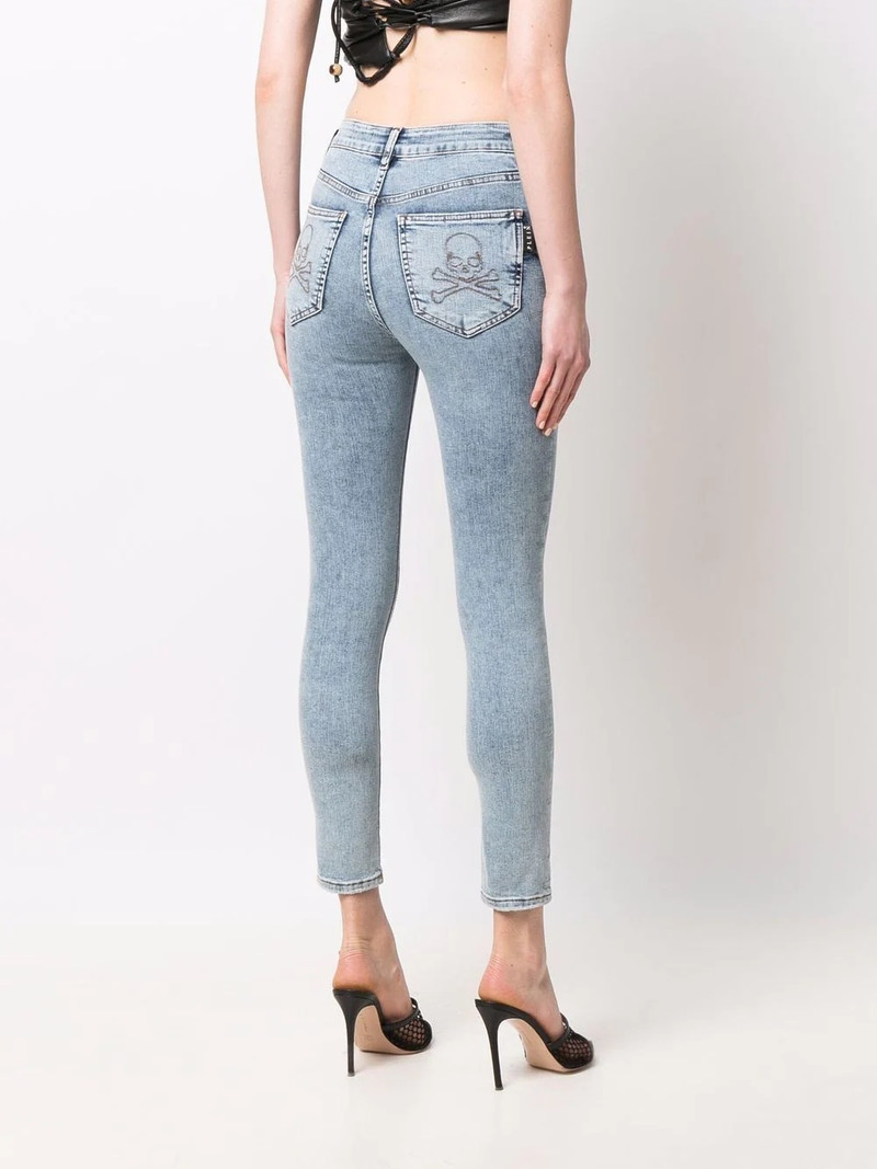 Skull embroidery skinny jeans 4