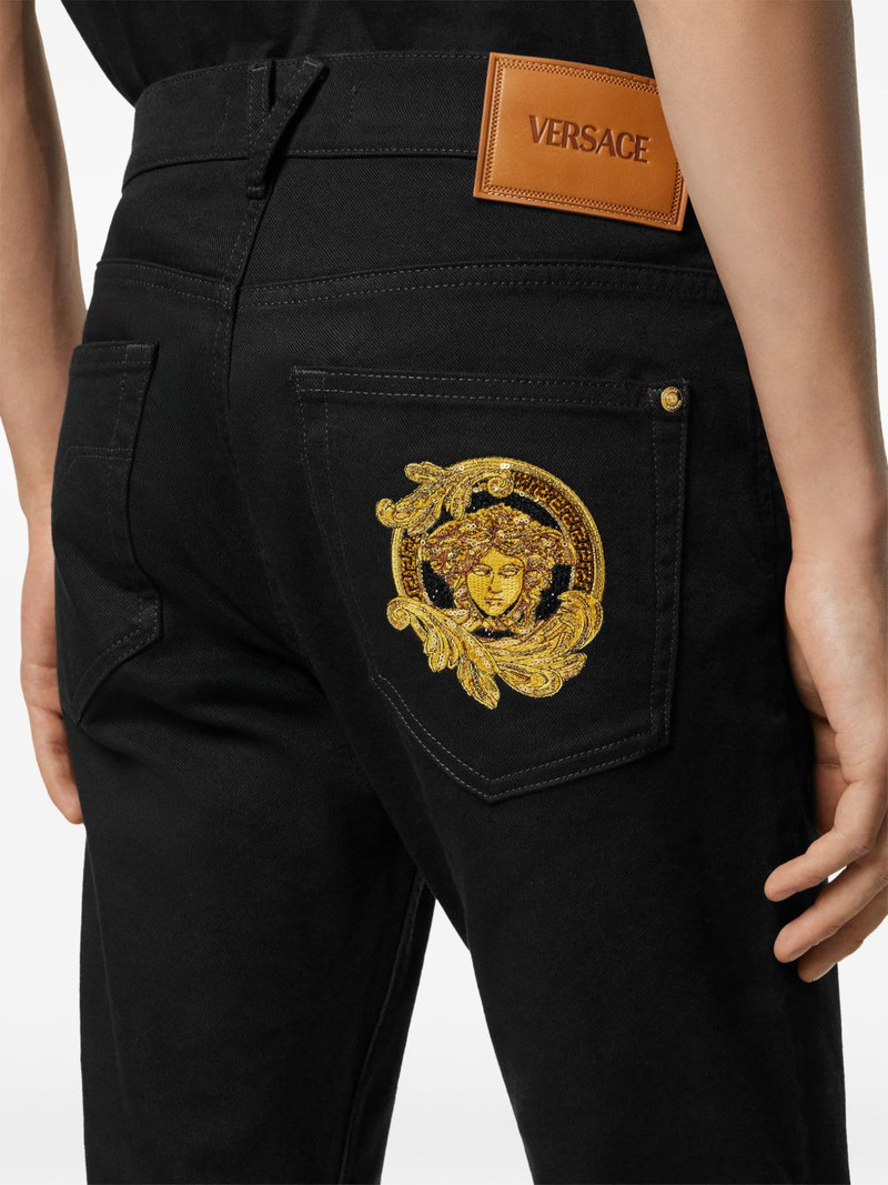 Medusa-embroidery jeans 5
