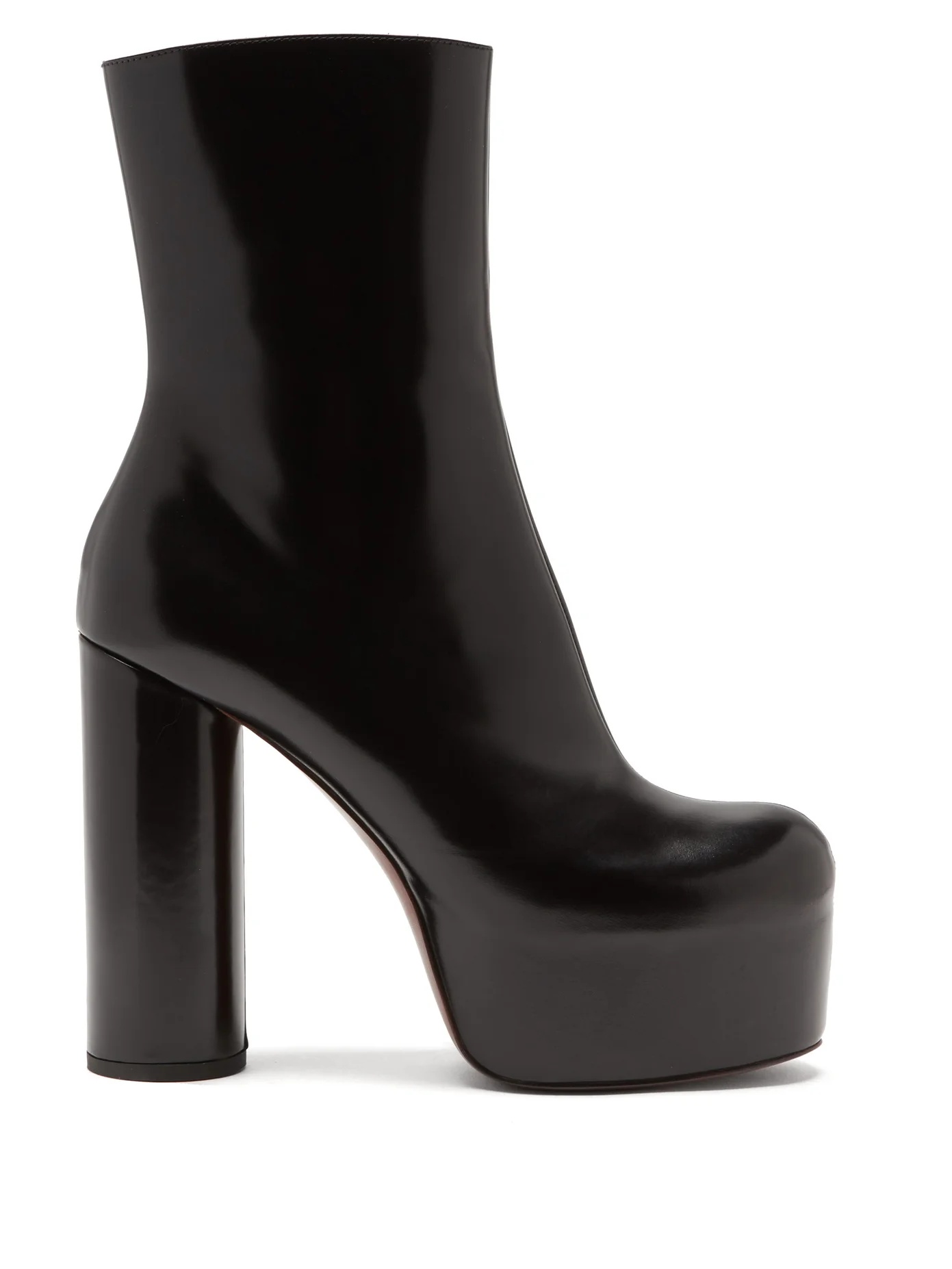 Platform heeled leather ankle boots - 1