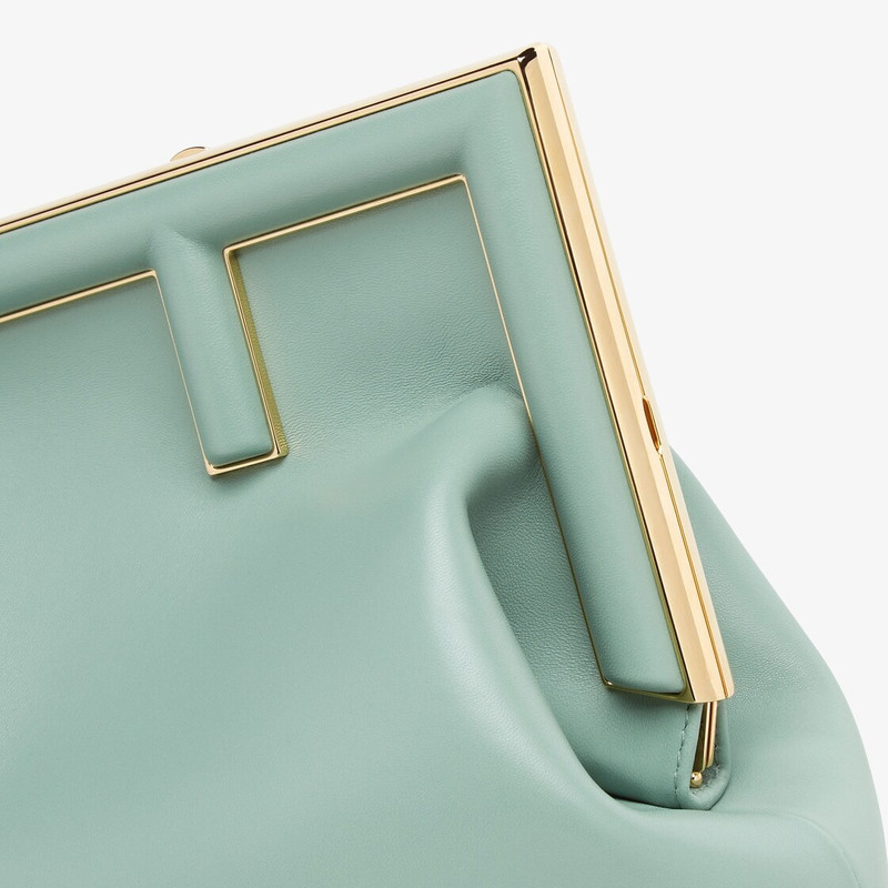 Medium Fendi First bag made of soft, mint green nappa leather with an oversized metal F clasp bound  5