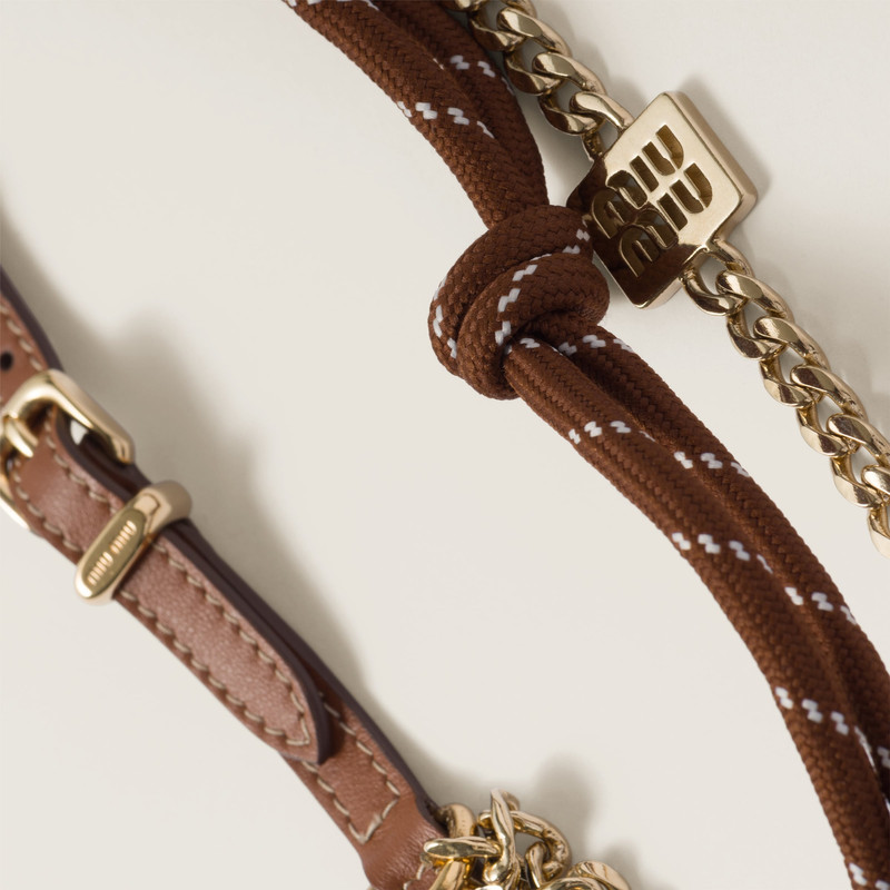 Miu Miu Leather, cord, and metal trick outlook