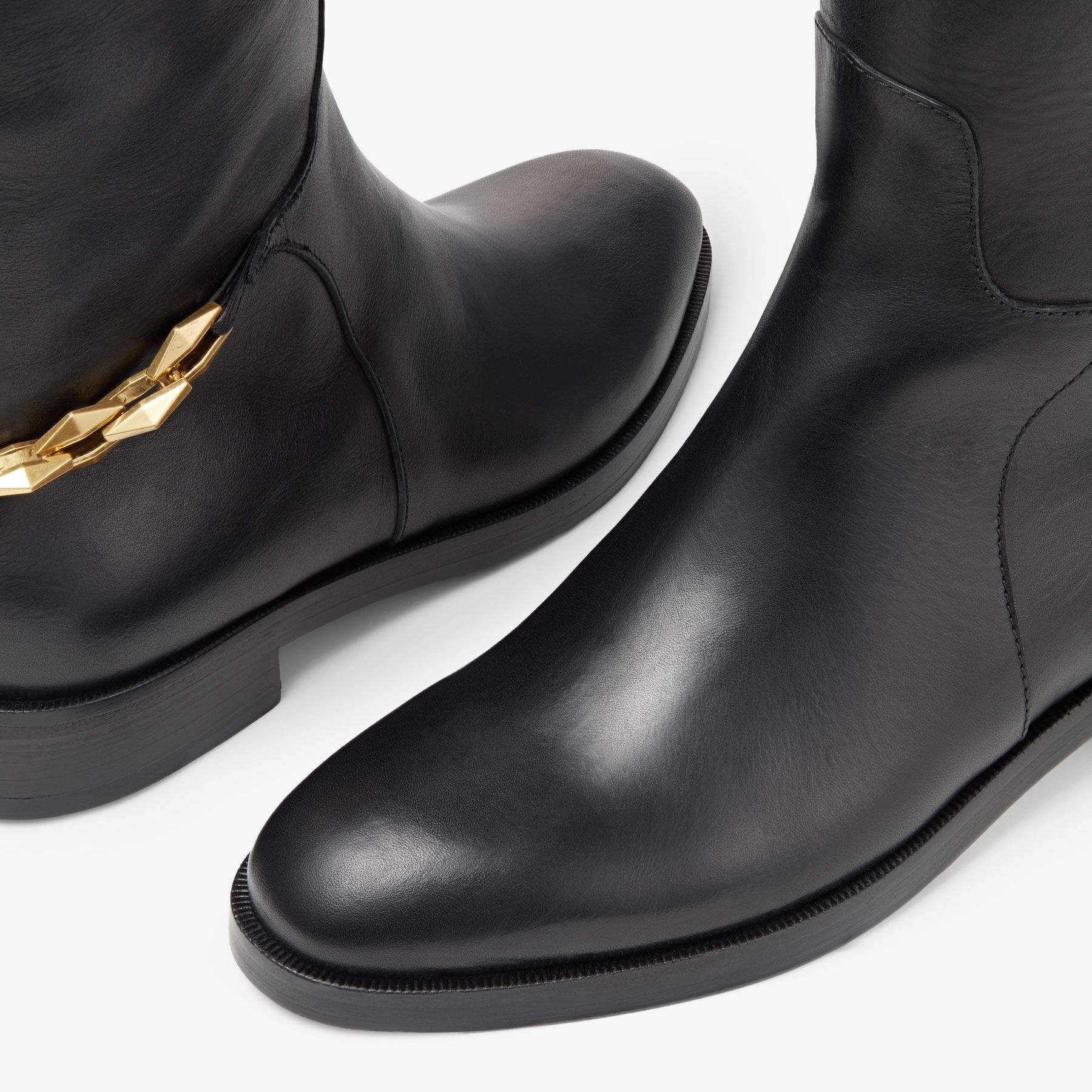 Nell Knee Boot Flat
Black Soft Vachetta Knee-High Boots with Chain - 4
