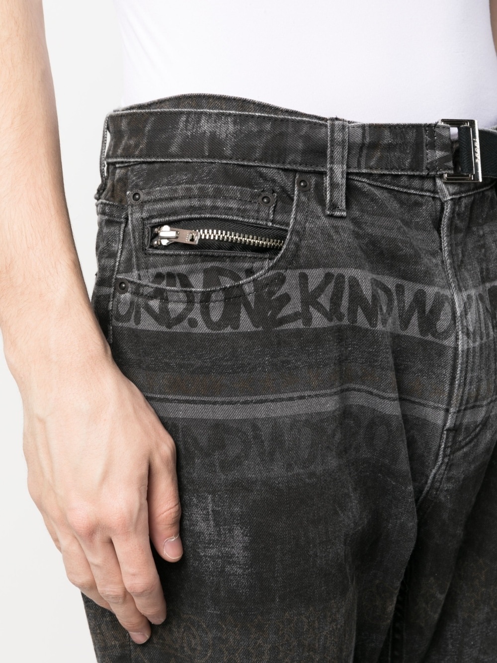 logo-pattern denim jeans - 5