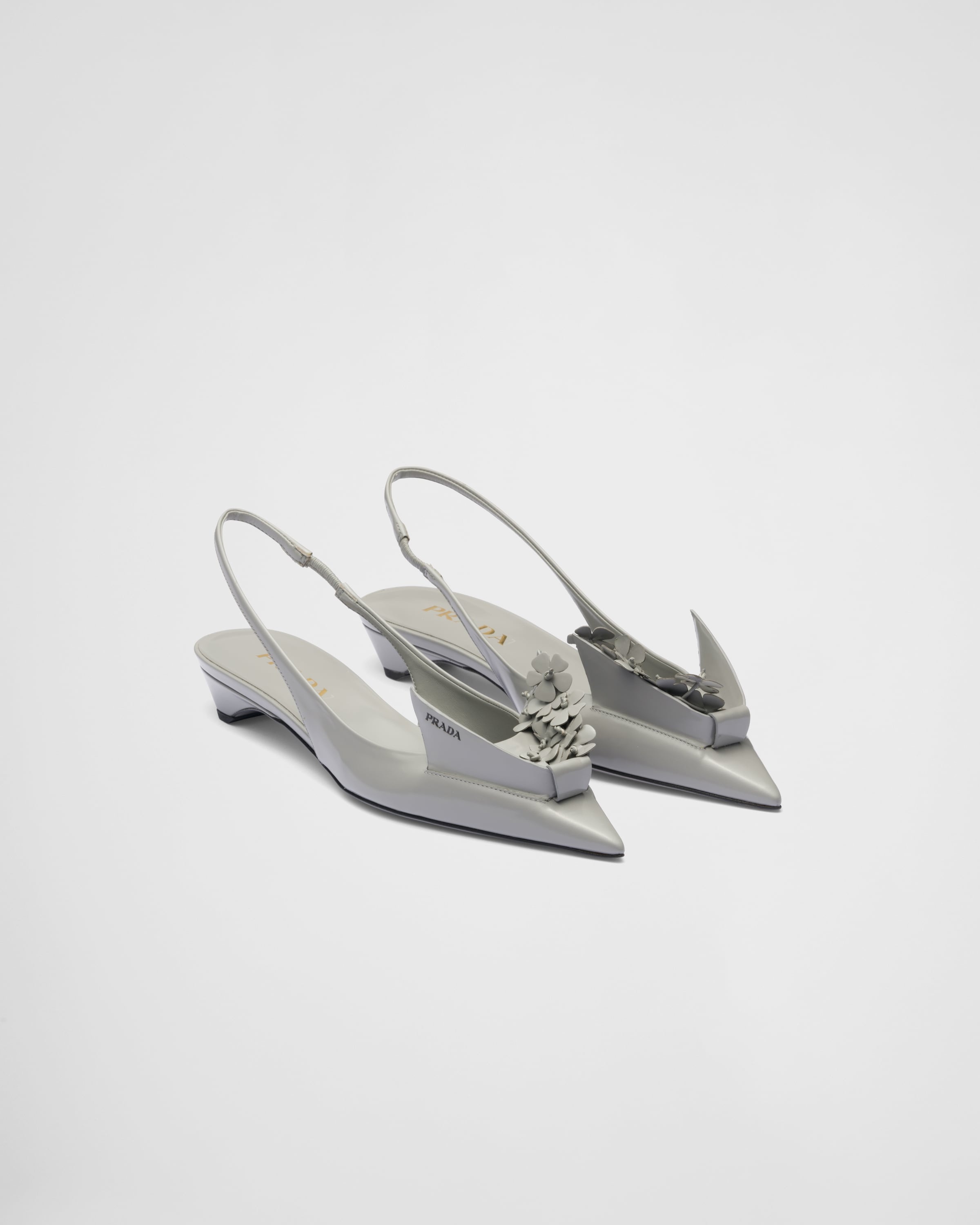 Brushed leather slingback pumps with floral appliques - 1
