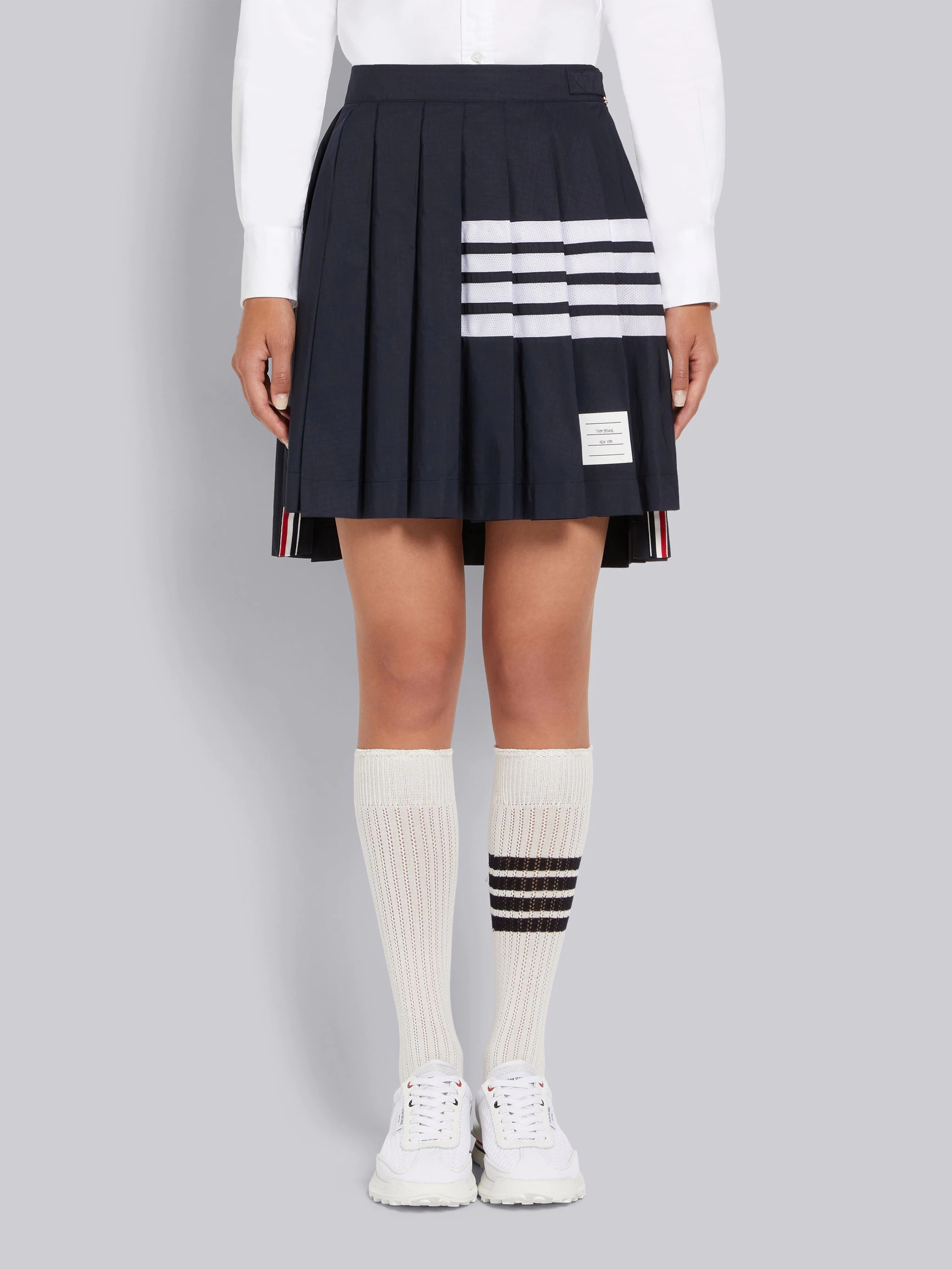 Navy Ripstop Mesh 4-Bar Dropped Back Pleated Mini Skirt - 1