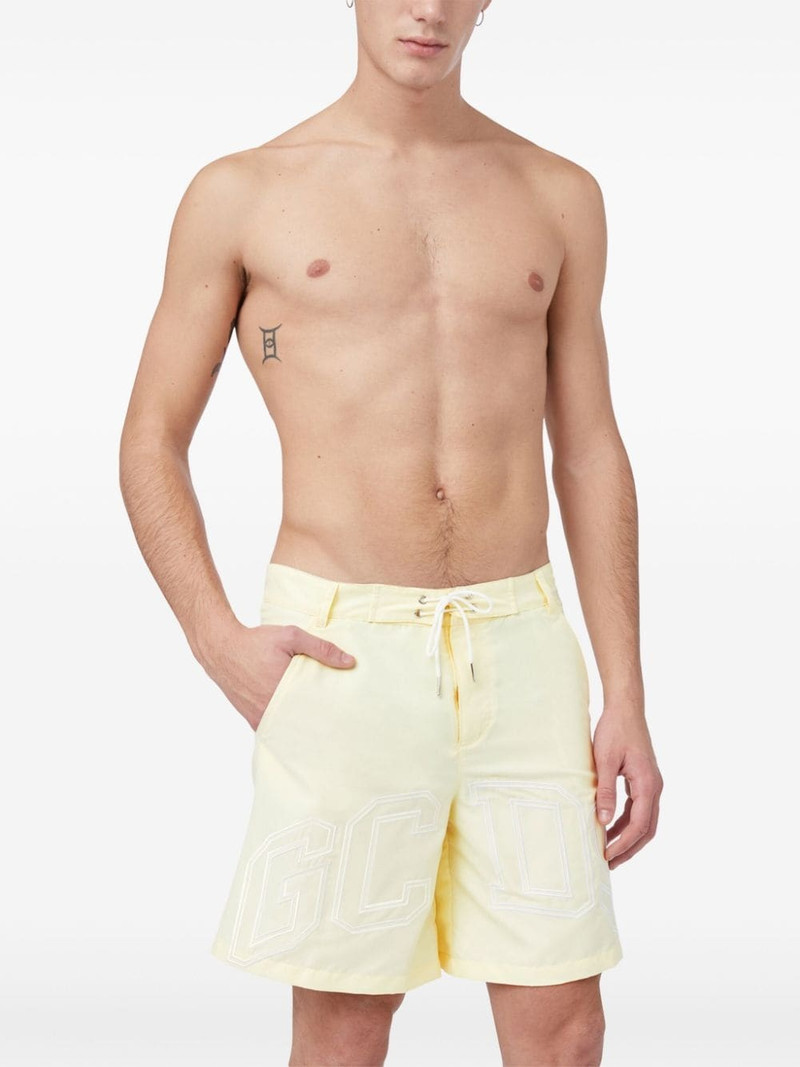 GCDS logo-print swim shorts outlook