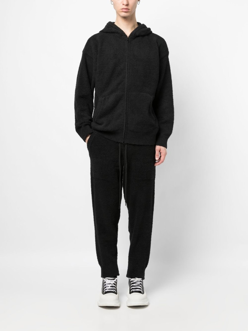 MASTERMIND WORLD logo-print fleece-texture track pants outlook