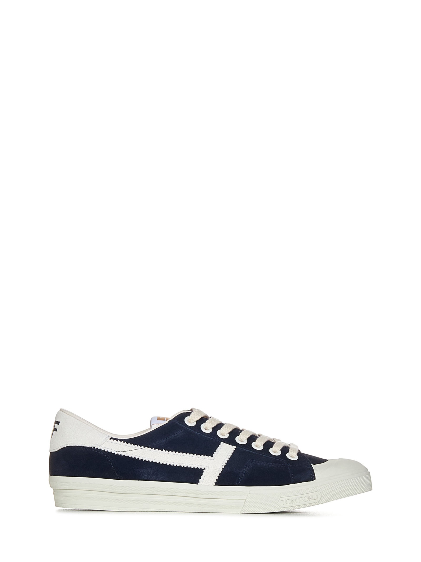 Midnight blue suede low-top sneakers with chalk-colored details and rubber sole. - 1